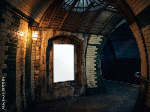 Vintage subway station interior with advertising space and warm lighting