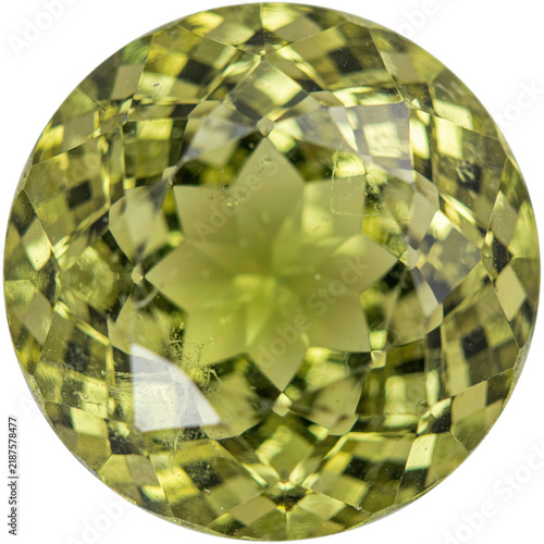 Round cut peridot gemstone with star facet pattern and translucent lime green coloration isolated on a transparent background