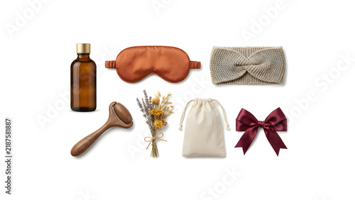Spa beauty kit set, satin eye mask, aromatherapy bottle, wooden face roller, dried flowers, luxurious relaxation accessories, self-care beauty treatment items, white background Thanksgiving