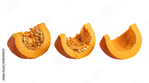 Three fresh pumpkin slices with seeds isolated on transparent background