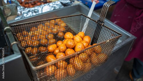 Loukoumades or Lokma, small round dough is fried until crunchy outside, airy inside. Topped with syrup, or glazed sugar, pair with a cup of hot tea or coffee. Greece, Turkish or Arabic cuisine