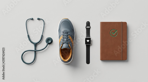 Fitness tracker and medical stethoscope flat lay for healthcare and wellness concept