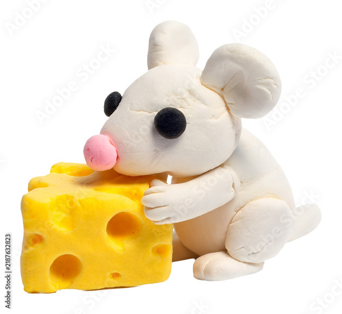 Cute white plasticine mouse with a piece of Swiss cheese