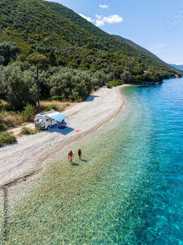 Stunning Kamari Beach in Lefkada Greece with clear waters and scenic mountain views