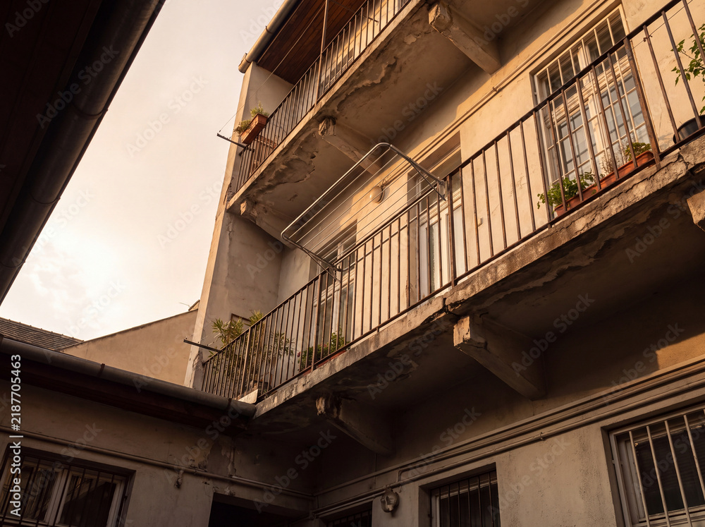 Fototapeta premium Narrow city balcony with drying rack empty Quiet Vacant Space Photographed for Commercial Editorial Background Use
