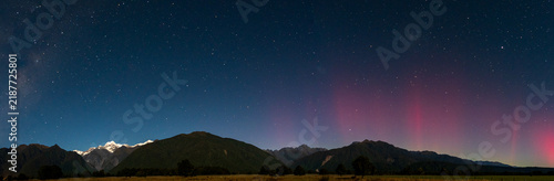 Fotografie Panoramic aurora australis and the Milky Way above the New Zealand at night, New