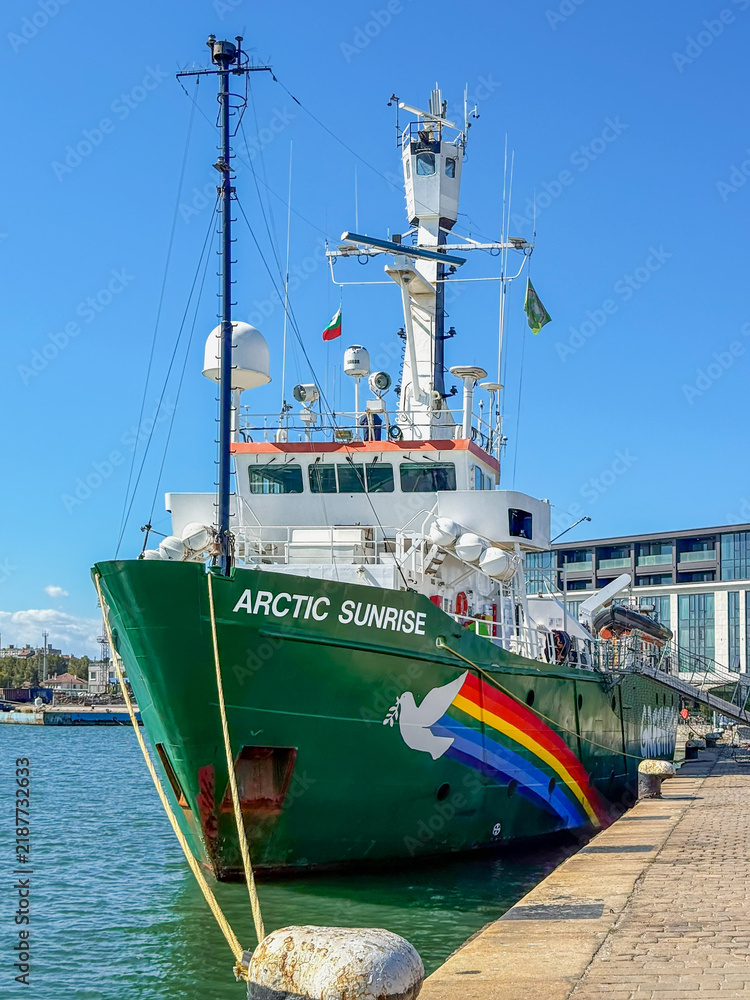Obraz premium Burgas, Bulgaria - September 07, 2026: Full view of Greenpeace Arctic Sunrise, Burgas port. Greenpeace research vessel from bow, showing green hull, bridge, masts, radar equipment, rainbow dove emblem