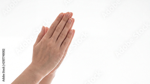 Принти на полотні Close up of woman hands pressed together in prayer or greeting