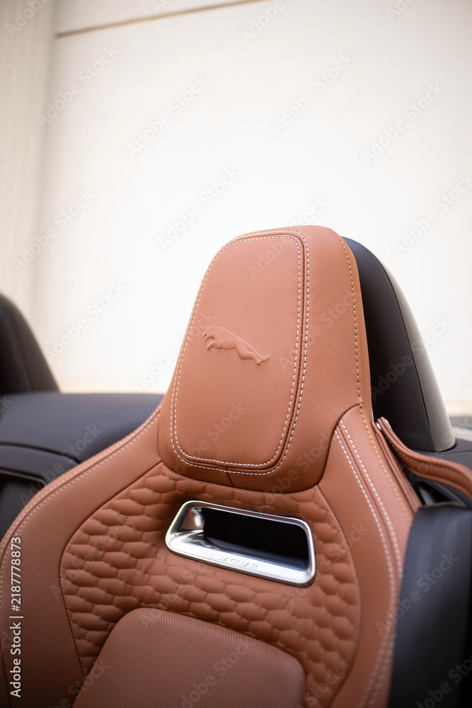 Obraz premium Jaguar F-Type Cabriolet Sports Car Tan Leather Seat Headrest Interior Detail
