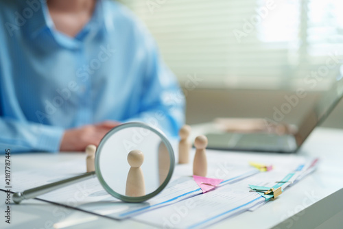 Konstfotografi Headhunter inspecting and isolating a standout executive candidate from a talent