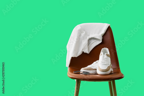 Obraz na plátne Minimalist lifestyle and casual fashion, white polo shirt and sneakers on a brow