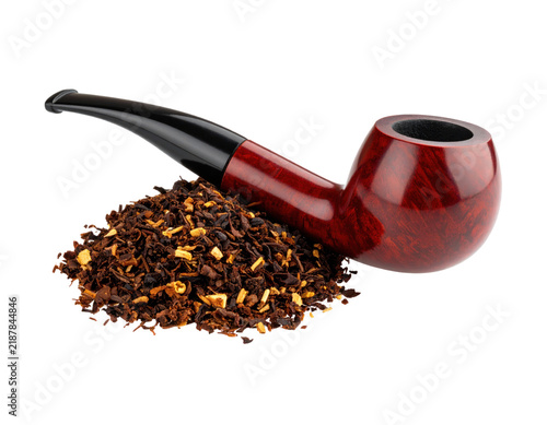 Traditional wooden smoking pipe resting on a heap of loose aromatic tobacco blend isolated on white background