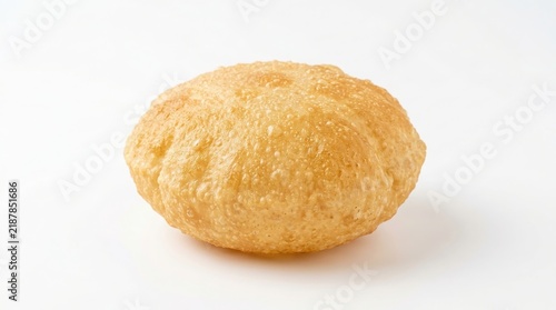 Round golden fried puri indian bread isolated on a plain white background with indian food deep fried traditional breakfast appetizing delicious isolated studio shot horizontal photography