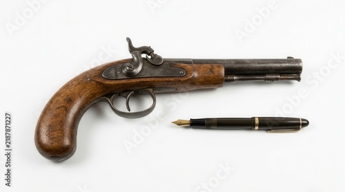 Antique Pistol And Fountain Pen Juxtaposed On White Background