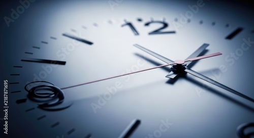 A close-up shot of a clock face displaying twelve o'clock. The clock hands are blurred, suggesting motion.