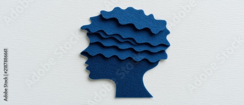 Creative art design featuring an abstract profile silhouette with layered blue waves for a unique visual representation