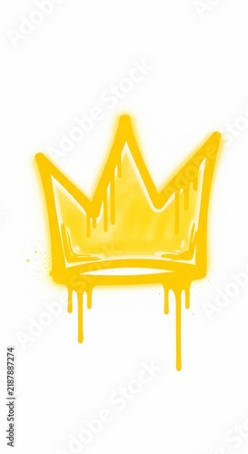 Graffiti-style yellow crown, spray paint effect, royalty symbol, graphic design, urban art, artistic illustration.