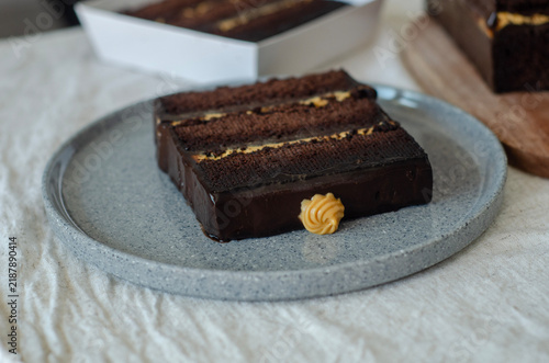Canvas Print Rich chocolate london cake layered with caramel and coated in glossy ganache gar