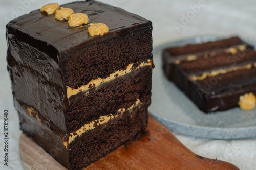 Canvas Print Rich chocolate london cake layered with caramel and coated in glossy ganache gar