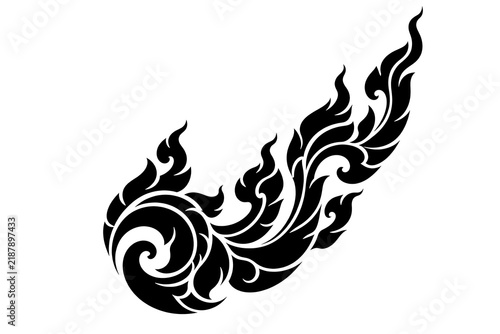 Traditional Thai Floral Ornament: A decorative black ornament inspired by traditional Thai art, featuring swirling floral patterns and flame-like motifs.
