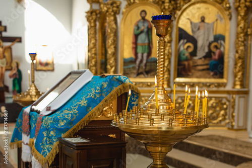 Fotografía Ornate Orthodox church altar with blue cloth, golden decorations and religious i