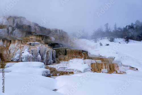 Cuadro en lienzo Mammoth Hot Springs hydrothermal terraces covered in winter snow at Yellowstone