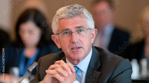 Senior Business Executive Speaking at Corporate Board Meeting