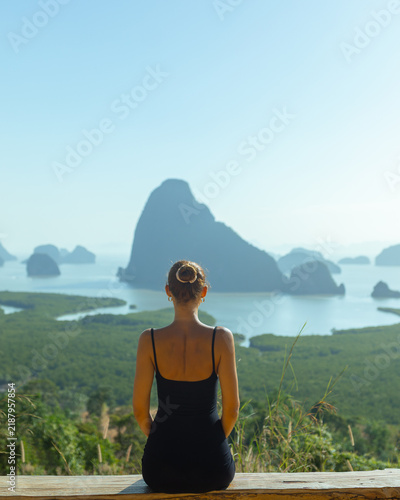 Woman Contemplating Scenic Phang Nga Bay Landscape at Sunrise