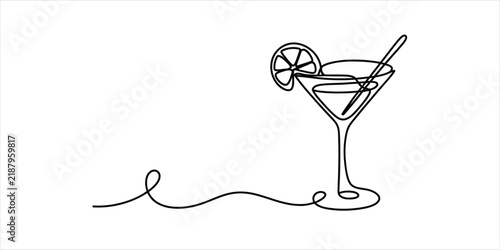 Continuous single line drawing of a martini cocktail glass with a slice of lemon
