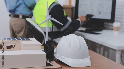 Close-up Of Person's engineer Hand Drawing Plan On Blue Print with architect equipment, Architects discussing at the table, team work and work flow construction concept
