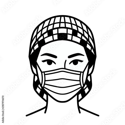 Person wearing a surgical mask and cap