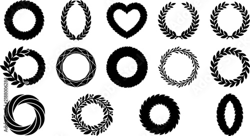 A collection of various decorative floral wreaths and circular frames in black silhouette style isolated on a white background for design projects