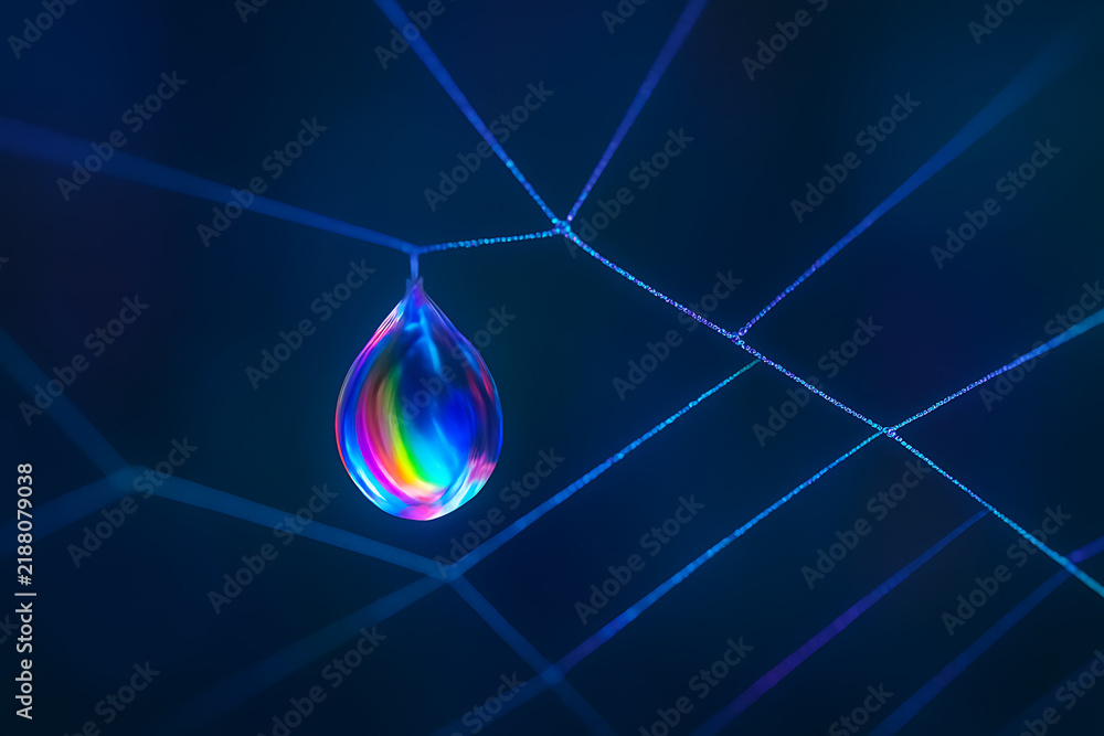 Obraz premium Abstract rainbow droplet with glowing web lines on dark blue digital background