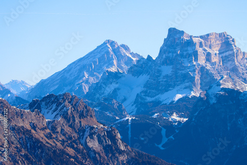 Detailed telephoto image of rugged mountain ridges and fresh snow in the spectacular Dolomites of northern Italy