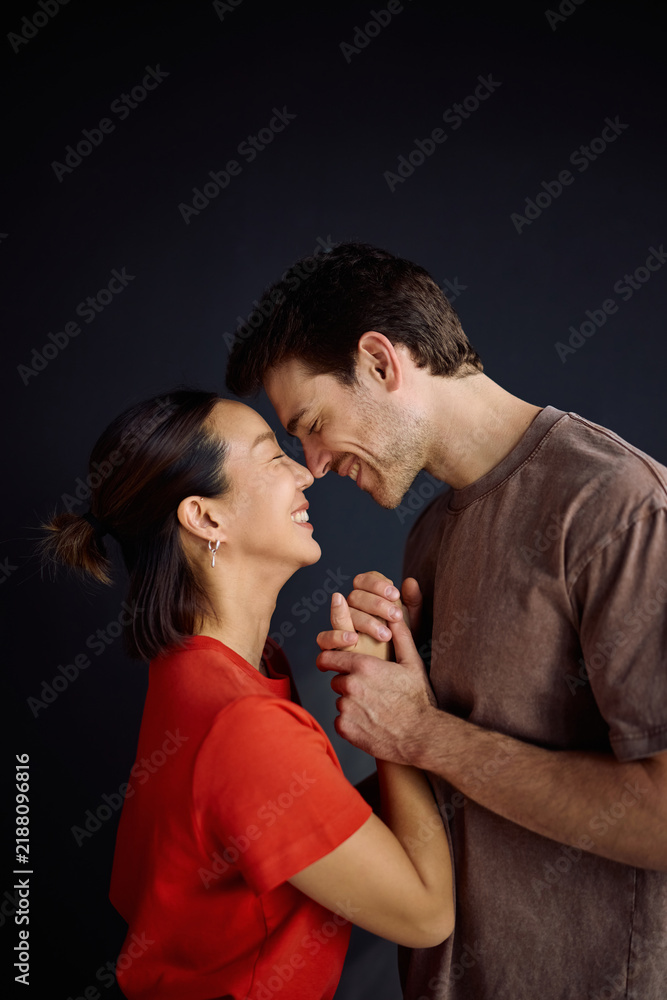 Fototapeta premium Happy couple enjoying in their love face to face.
