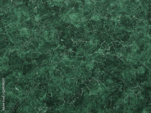 Green marble surface with natural mineral veining