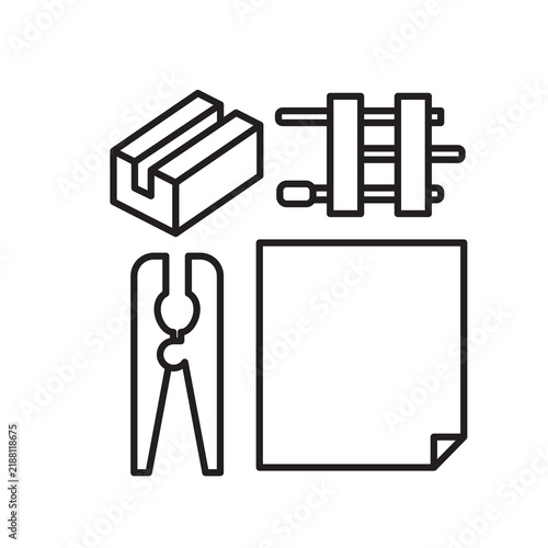Fotografie Simple line icon showing a bookbinding punching cradle, clamp, bone folder, and paper sheet