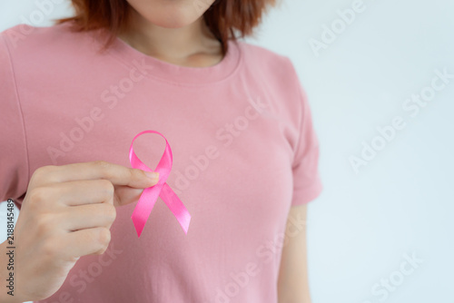 Fotografie Woman and pink ribbon breast cancer awareness