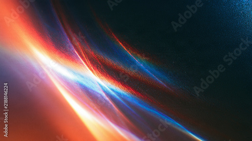 Abstract dark metallic surface with colorful spectral refraction light wave background, shimmering holographic backdrop copy space