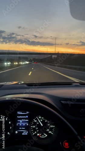 Driving on highway at sunset