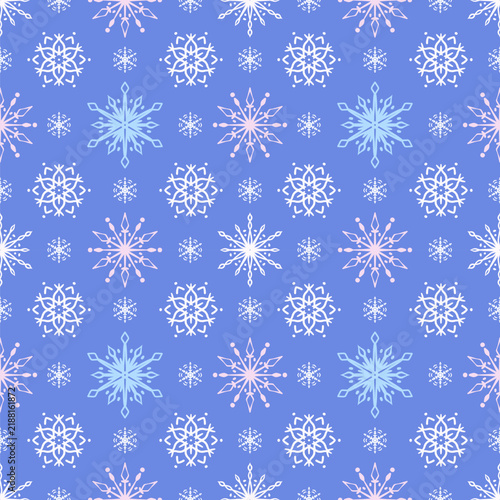 Festive Seamless Snowflake Pattern on Blue Background for Winter Holiday Design and Wrapping Paper