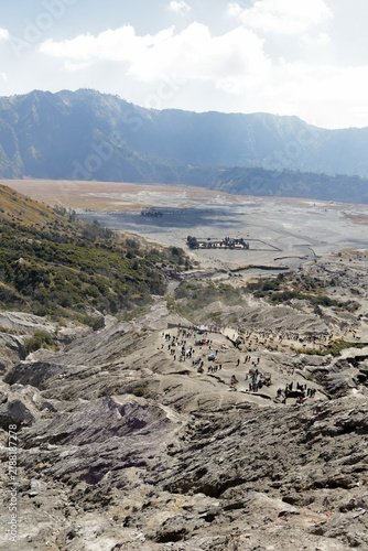 Obraz na płótnie Wide scenic view of Mount Bromo sea of sand caldera with volcanic rock formation