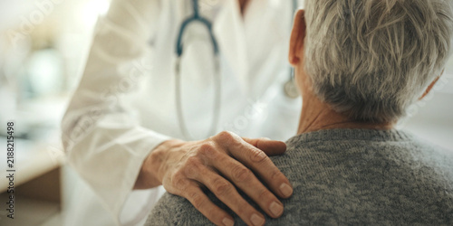 Lifestyle Senior Care. Take care with attentiveness and medical compassion with the doctor who places their hand on the elder shoulder