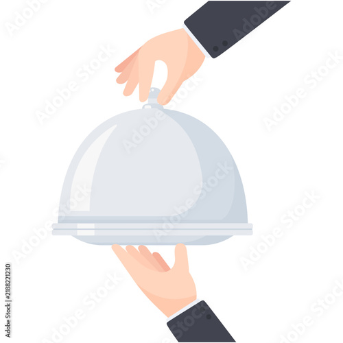 Professional restaurant service elegant hands unveil a gourmet meal from under a gleaming silver cloche