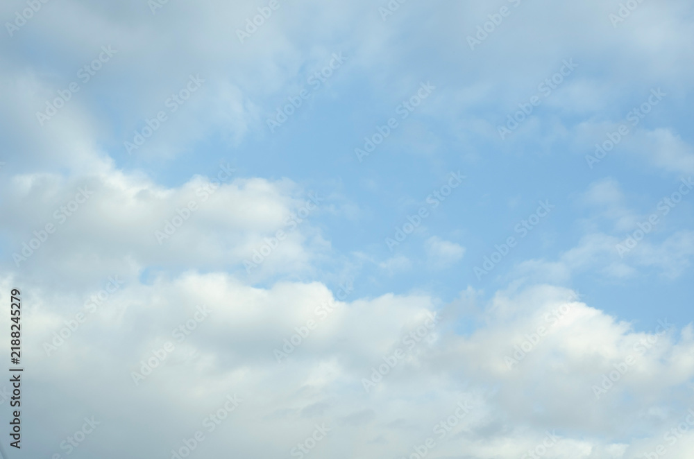 Obraz premium Blue Sky with Soft White Clouds and Natural Cloudscape Background