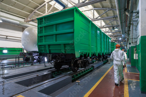 The painting process of new railway cars in a special workshop.