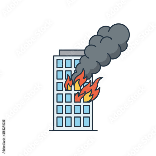Building on fire with smoke billowing out of windows.
