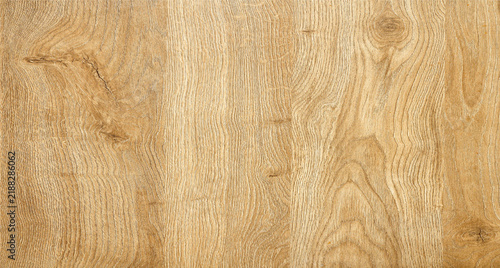 Pale blonde oak wood texture background banner with natural swirling grain lines for minimal product mockup presentation backdrop