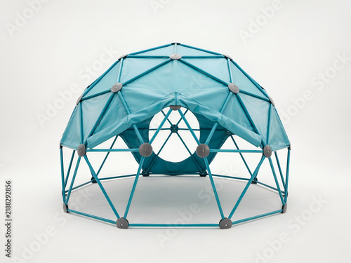 Turquoise geodesic dome tent for children's outdoor play during daytime with a spacious interior