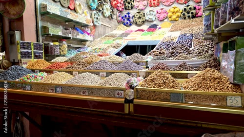 Marrakech, morocco. August 10, 2026. Colorful display of nuts, dried fruits, and spices in a traditional market stall. Authentic moroccan souk in marrakech full of exotic flavors